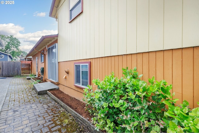 7430 N Burr Ave, Portland, OR 97203 - view of home's exterior with a patio area and fence