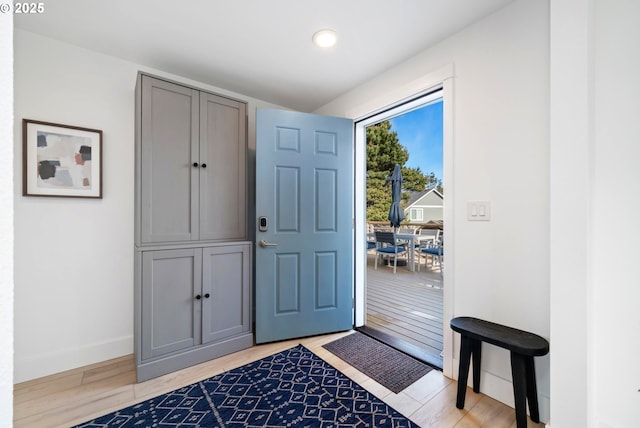 90 Beach Dr, Manzanita, OR 97130 - entryway with light wood-style flooring and recessed lighting