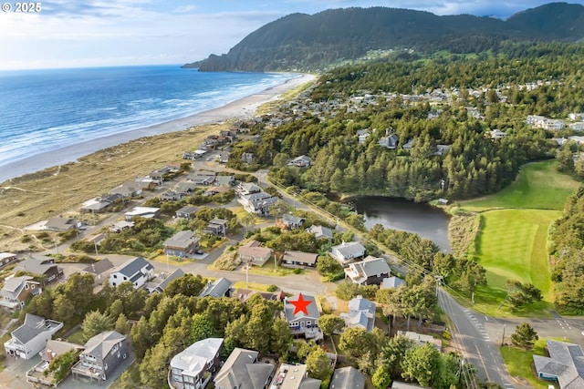 90 Beach Dr, Manzanita, OR 97130 - aerial overview of property's location with a water and mountain view and nearby suburban area