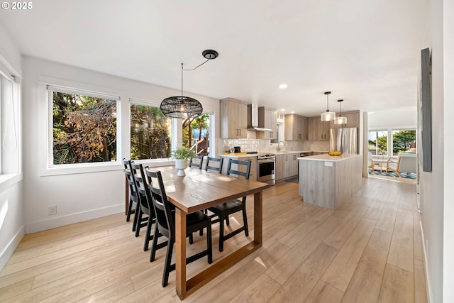 90 Beach Dr, Manzanita, OR 97130 - dining area featuring plenty of natural light, light wood-style flooring, and recessed lighting