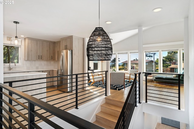 90 Beach Dr, Manzanita, OR 97130 - stairway with recessed lighting, vaulted ceiling, and wood finished floors