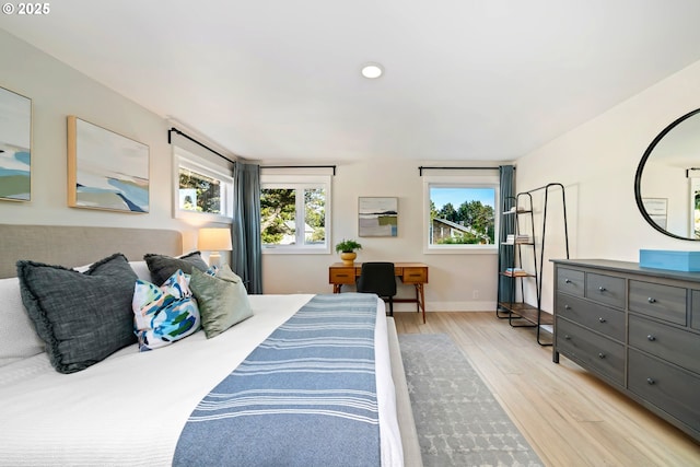 90 Beach Dr, Manzanita, OR 97130 - bedroom featuring light wood-style flooring and recessed lighting