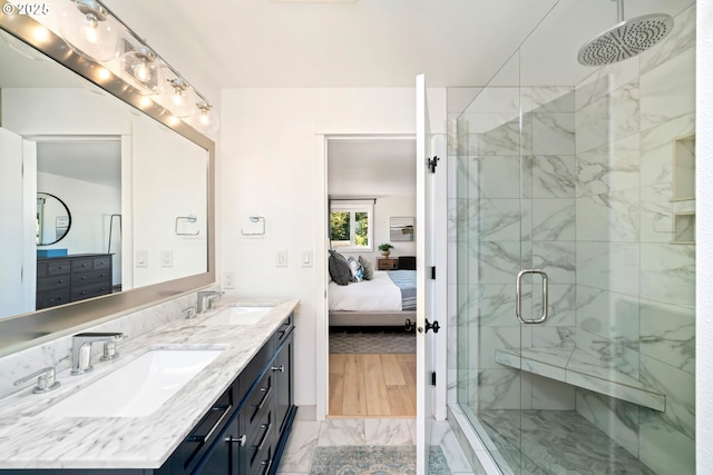 90 Beach Dr, Manzanita, OR 97130 - ensuite bathroom with double vanity, a shower stall, and marble finish flooring