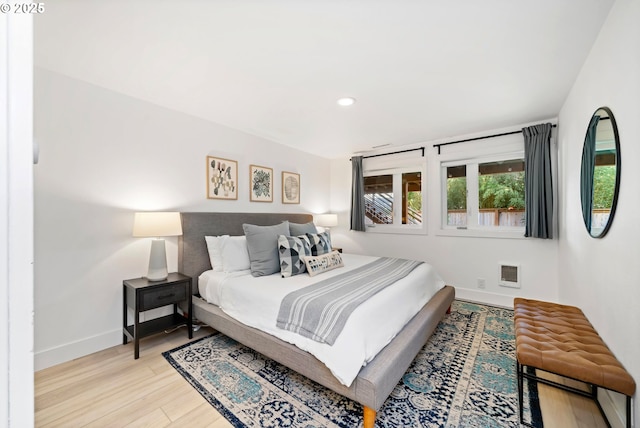 90 Beach Dr, Manzanita, OR 97130 - bedroom with wood finished floors and recessed lighting