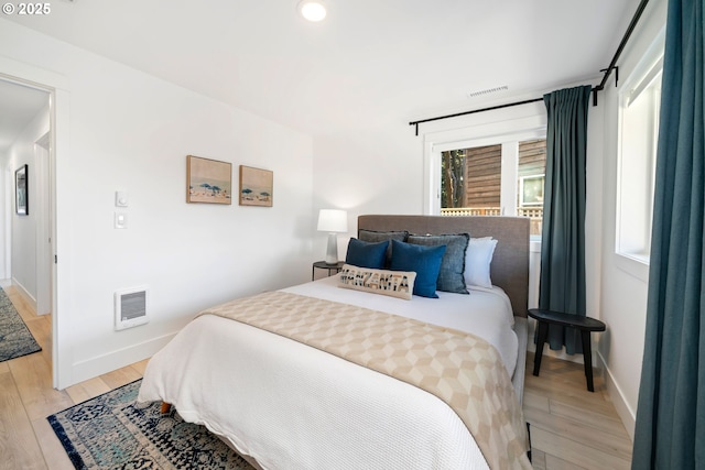 90 Beach Dr, Manzanita, OR 97130 - bedroom with light wood-type flooring and recessed lighting