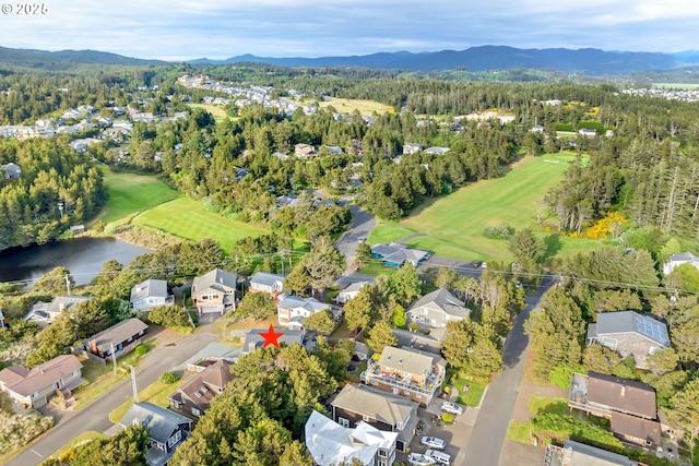 90 Beach Dr, Manzanita, OR 97130 - view of property location featuring mountains, nearby suburban area, and a local golf course