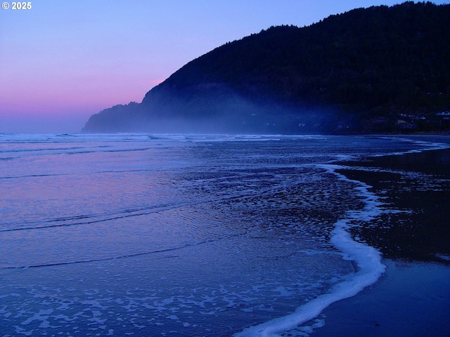 90 Beach Dr, Manzanita, OR 97130 - water view featuring a mountain backdrop