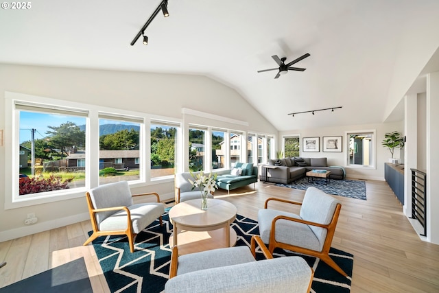 90 Beach Dr, Manzanita, OR 97130 - sunroom / solarium featuring track lighting and vaulted ceiling