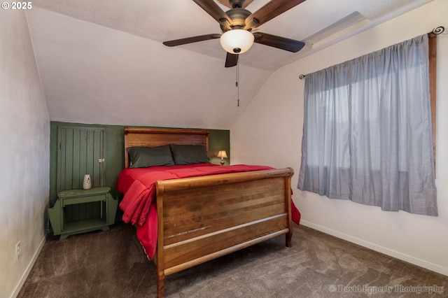 carpeted bedroom featuring lofted ceiling and ceiling fan