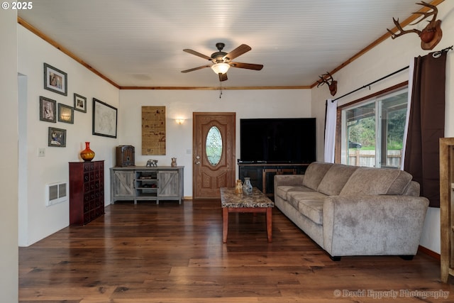 living room with ceiling fan, crown molding, and dark hardwood / wood-style floors