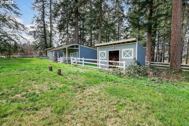 exterior space featuring an outbuilding and an exterior structure