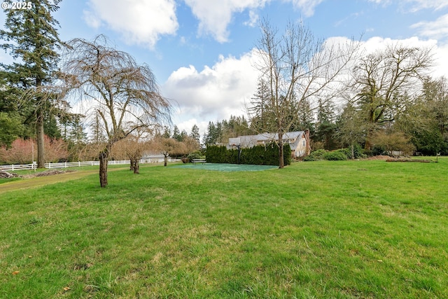 view of yard with fence