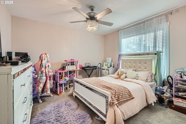 bedroom featuring carpet flooring and a ceiling fan