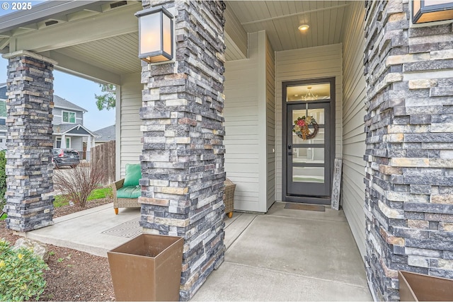 view of exterior entry with stone siding