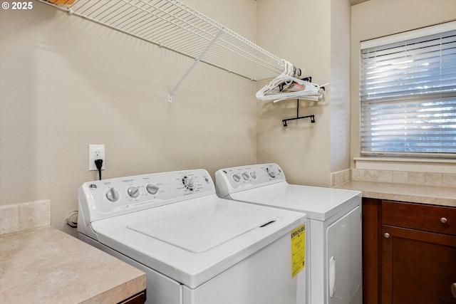 washroom with separate washer and dryer