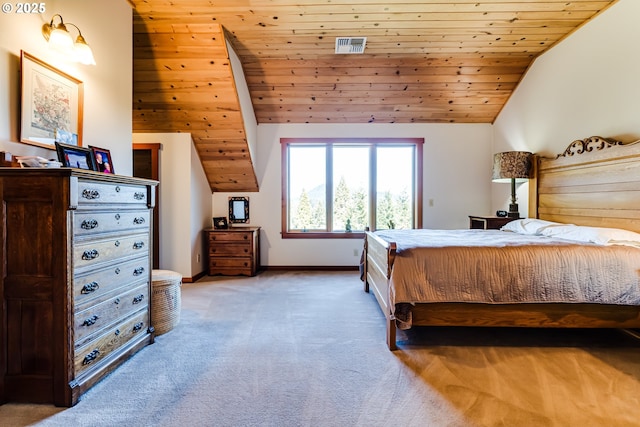 bedroom with visible vents, baseboards, light colored carpet, wood ceiling, and vaulted ceiling