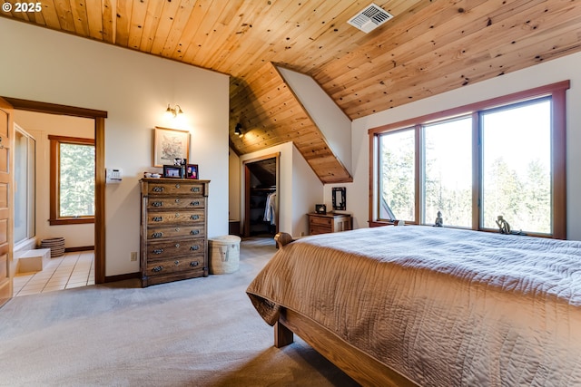 carpeted bedroom with lofted ceiling, a spacious closet, wooden ceiling, and visible vents