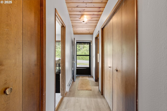 272 Whipple Tree Dr, Yoncalla, OR 97499 - hall featuring light wood finished floors, wood ceiling, and a textured wall