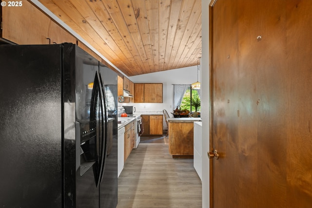 272 Whipple Tree Dr, Yoncalla, OR 97499 - kitchen with black fridge with ice dispenser, vaulted ceiling, wooden ceiling, brown cabinetry, and light wood-style flooring