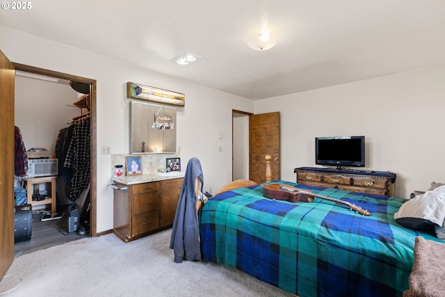 272 Whipple Tree Dr, Yoncalla, OR 97499 - bedroom featuring light carpet, a walk in closet, and a closet