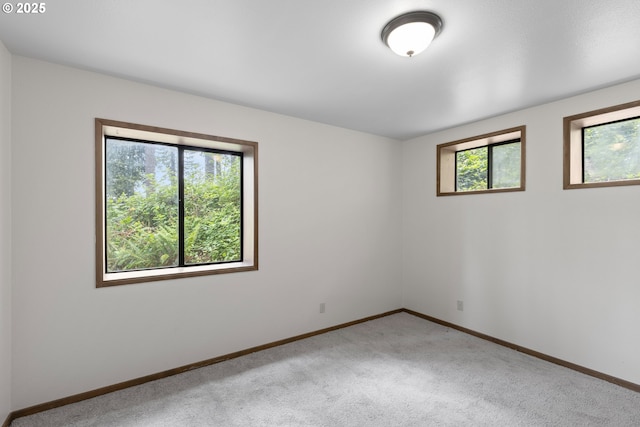 272 Whipple Tree Dr, Yoncalla, OR 97499 - empty room with baseboards and light colored carpet