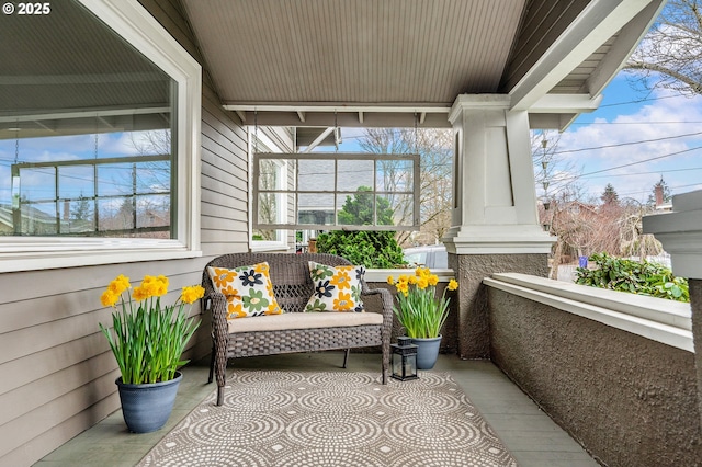 balcony featuring a porch