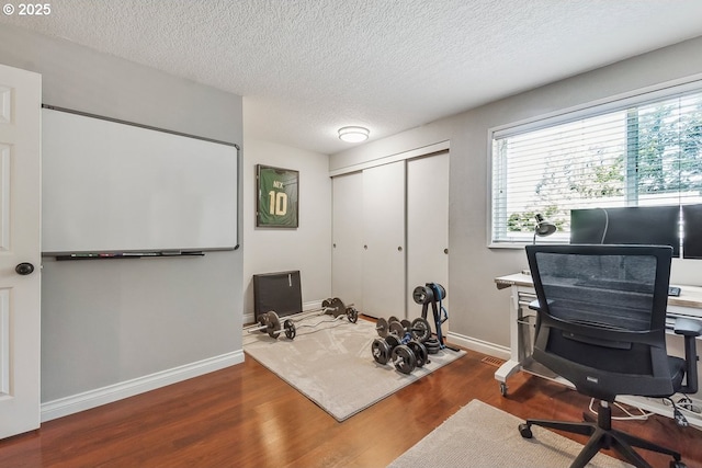 4880 SW Scholls Ferry Rd Unit 14, Portland, OR 97225 - office featuring baseboards, a textured ceiling, and wood finished floors