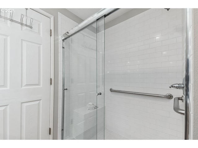 full bath featuring a stall shower