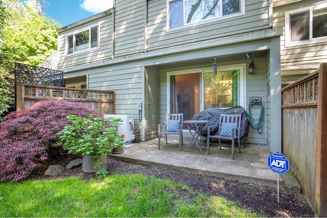 4880 SW Scholls Ferry Rd Unit 14, Portland, OR 97225 - back of property featuring a patio, fence, and ac unit