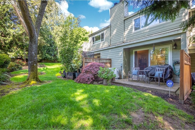 4880 SW Scholls Ferry Rd Unit 14, Portland, OR 97225 - back of house with a yard, a chimney, and a patio area