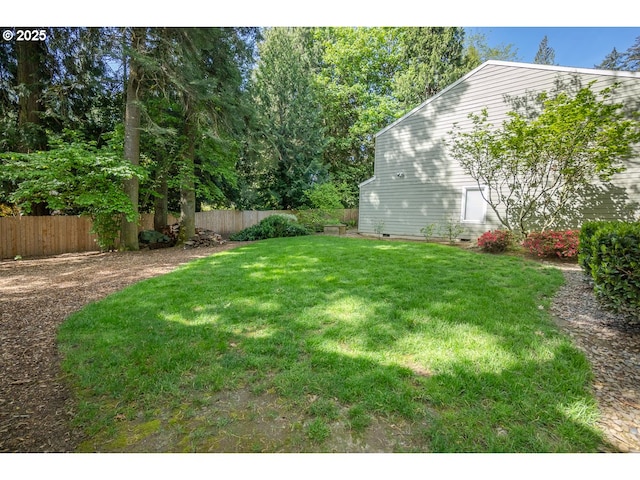 view of yard with fence