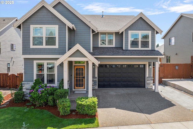 12241 Mimosa Way, Oregon City, OR 97045 - craftsman-style house with driveway, an attached garage, stone siding, and a shingled roof