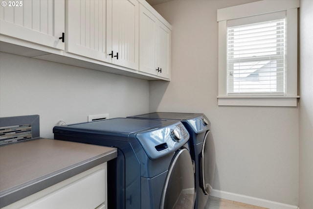 12241 Mimosa Way, Oregon City, OR 97045 - laundry area featuring cabinet space and separate washer and dryer
