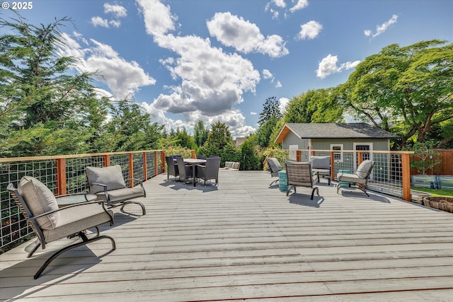 12241 Mimosa Way, Oregon City, OR 97045 - wooden deck featuring outdoor dining space