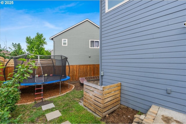 2341 Turnbull Ct, Forest Grove, OR 97116 - fenced backyard with a trampoline