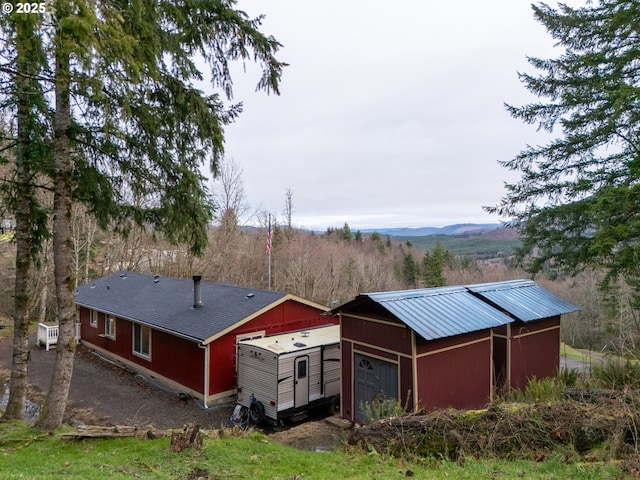 exterior space featuring a mountain view