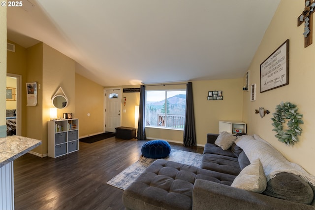 living room featuring dark wood-type flooring