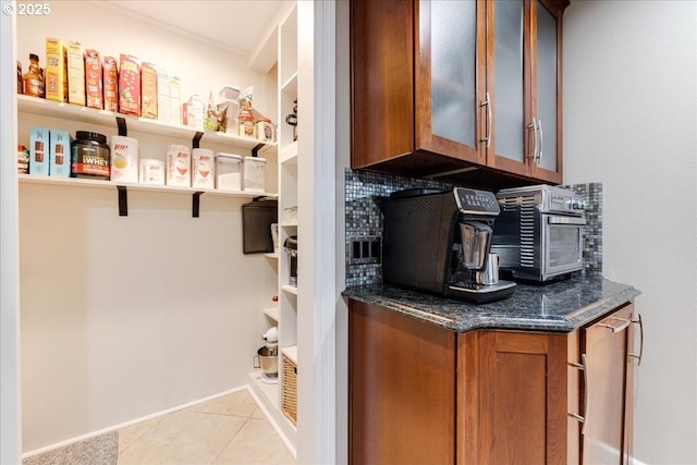 pantry featuring a toaster