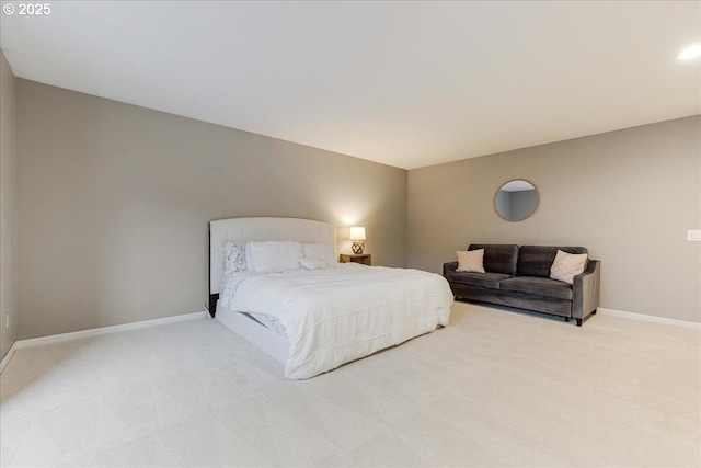 bedroom featuring carpet flooring and baseboards