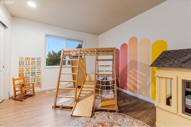 bedroom featuring visible vents, recessed lighting, wood finished floors, and baseboards