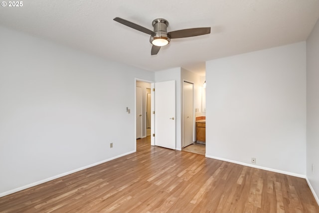 15000 SW Farmington Rd Unit 51, Beaverton, OR 97007 - unfurnished bedroom featuring light wood-style flooring, baseboards, ensuite bathroom, and ceiling fan