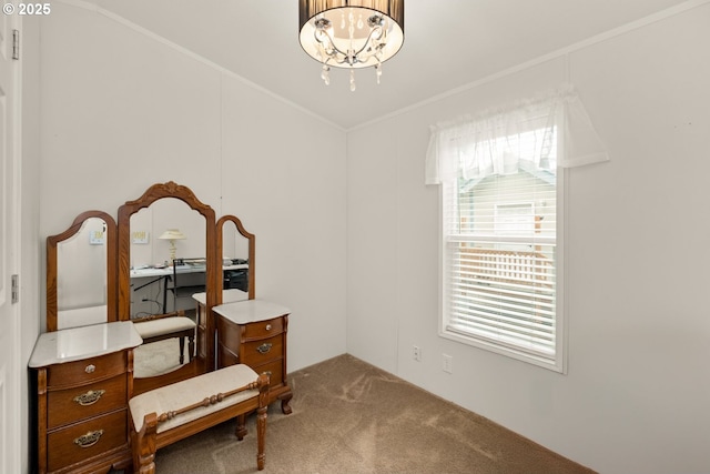 office area with carpet floors, crown molding, and a notable chandelier