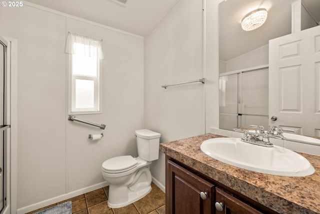 full bath with baseboards, toilet, a shower stall, and vanity