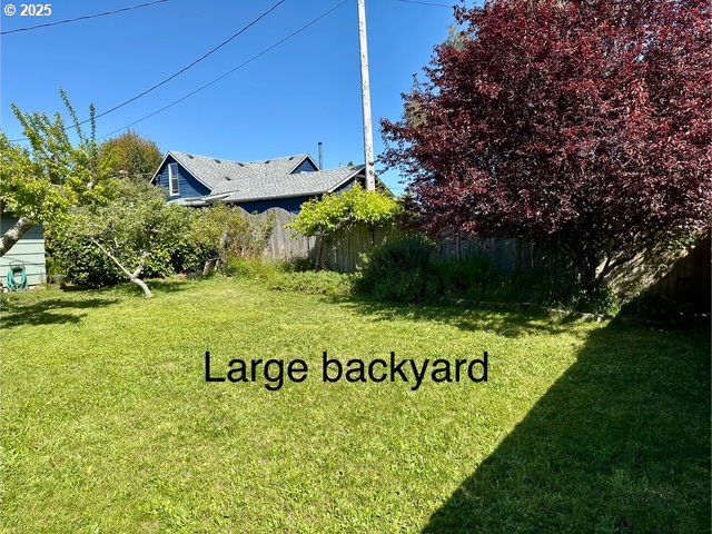 view of yard featuring fence
