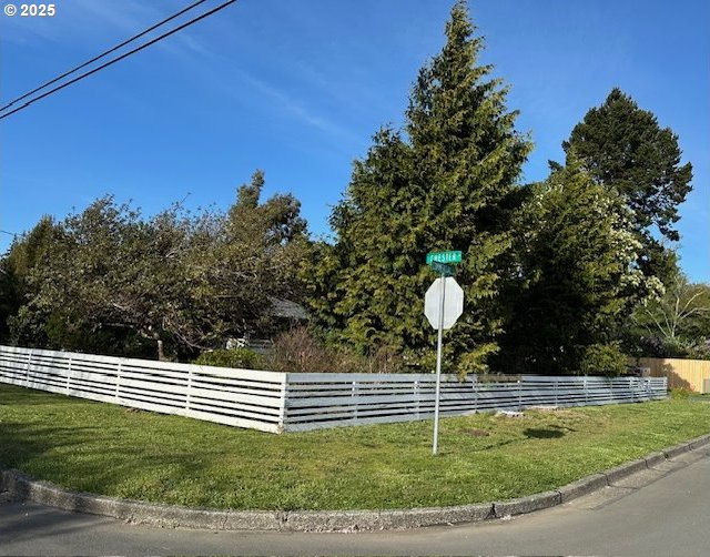 exterior space with curbs and traffic signs