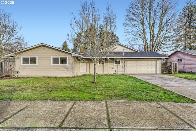 ranch-style house featuring a garage and a front lawn