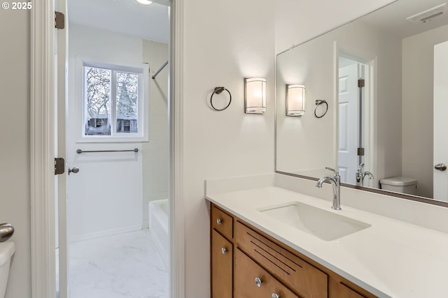 full bathroom with vanity, toilet, and shower / tub combination