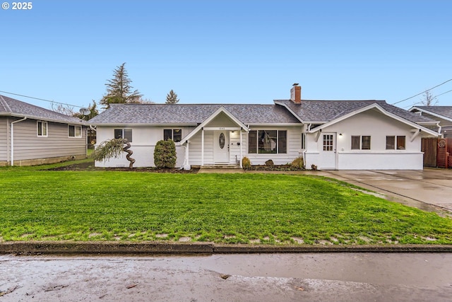 ranch-style house with a front lawn