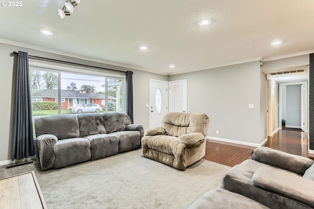 living room featuring hardwood / wood-style floors and ornamental molding