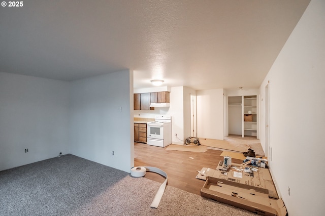 living room with a textured ceiling